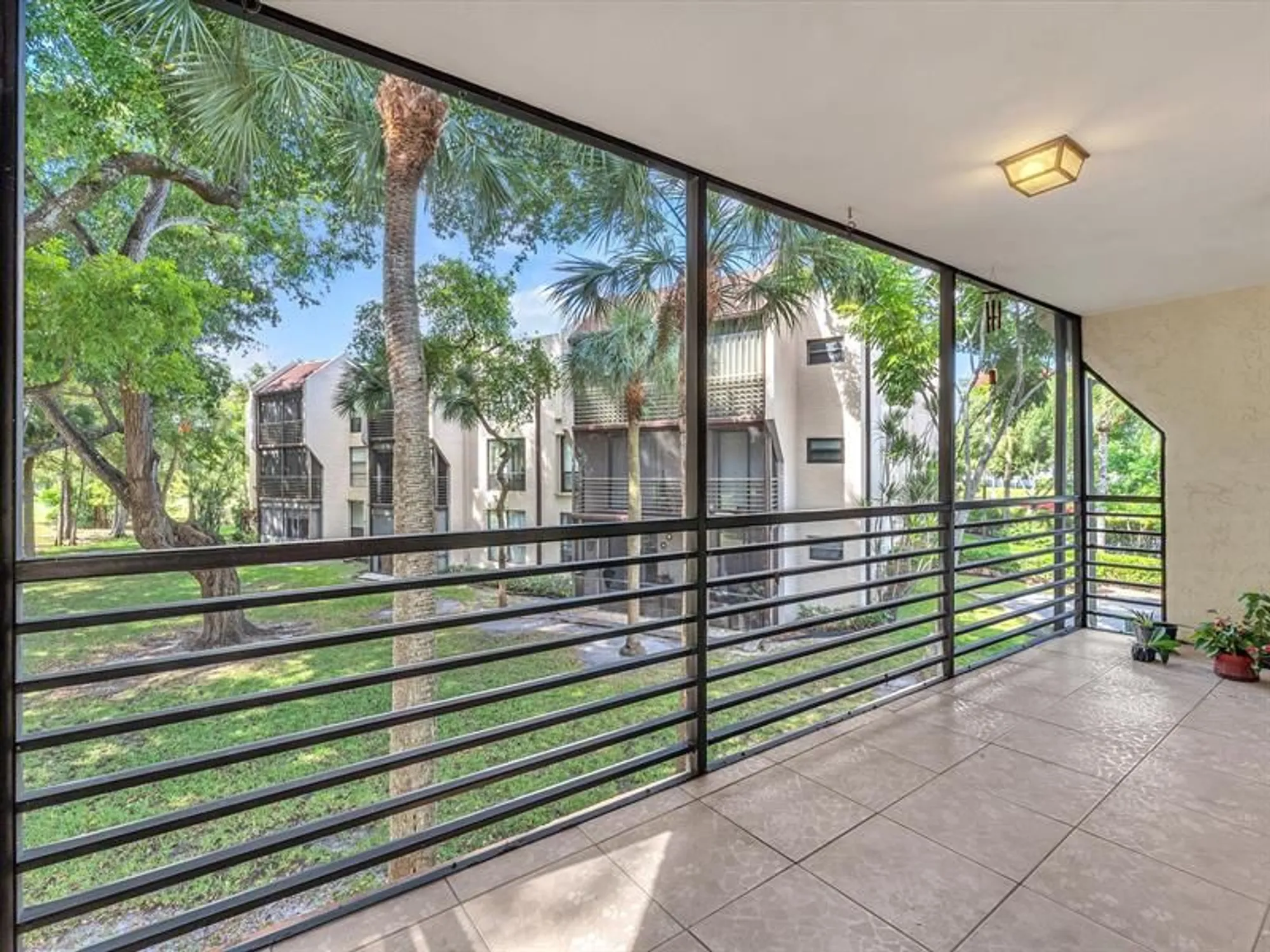Property Slideshow image 22 of 37 | 7750 w mcnab rd apt 202, Tamarac, FL, 33321