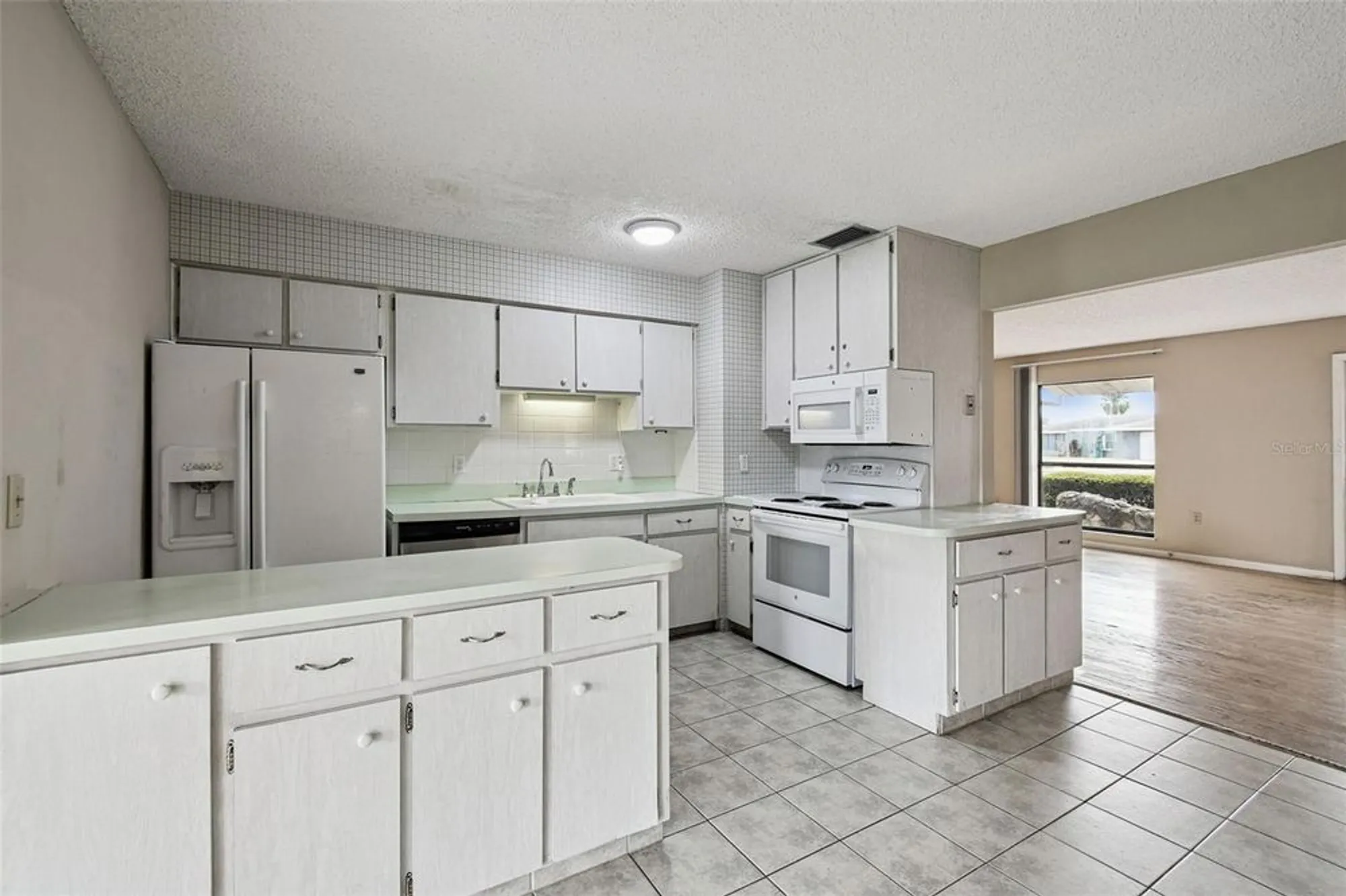 Property Slideshow image 25 of 100 | 1803 pineapple palm ct, Sun City Center, FL, 33573