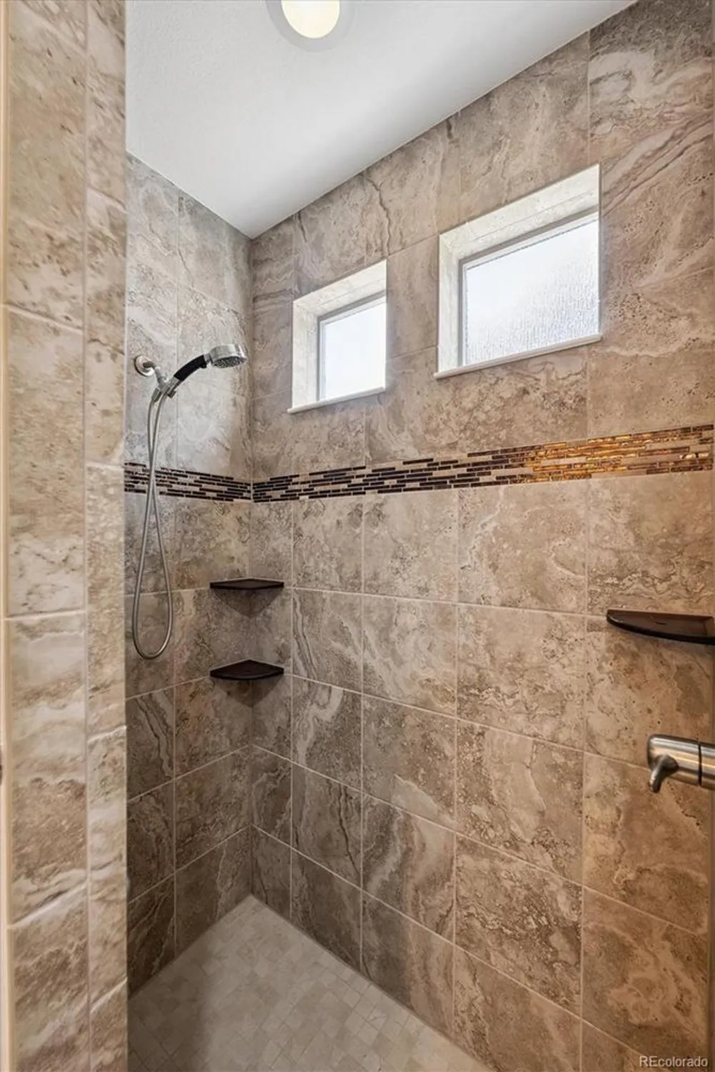 Property Slideshow image 14 of 24 | 5520 genoa st, Denver, CO, 80249