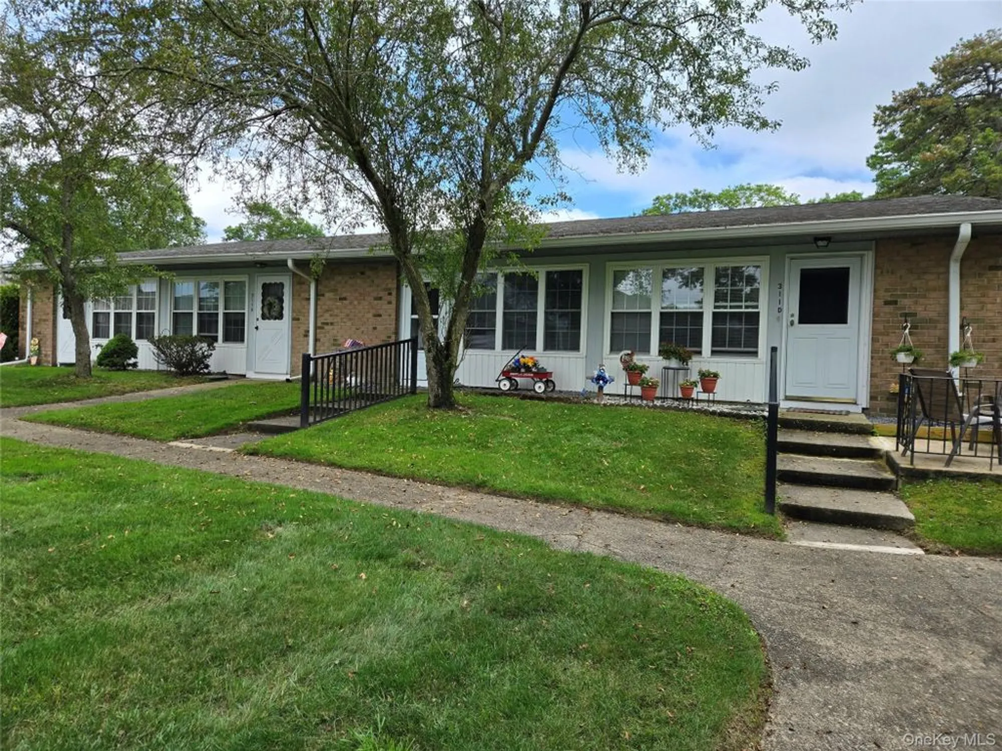 Property Slideshow image 1 of 15 | 311 woodbridge dr 311-c, Ridge, NY, 11961