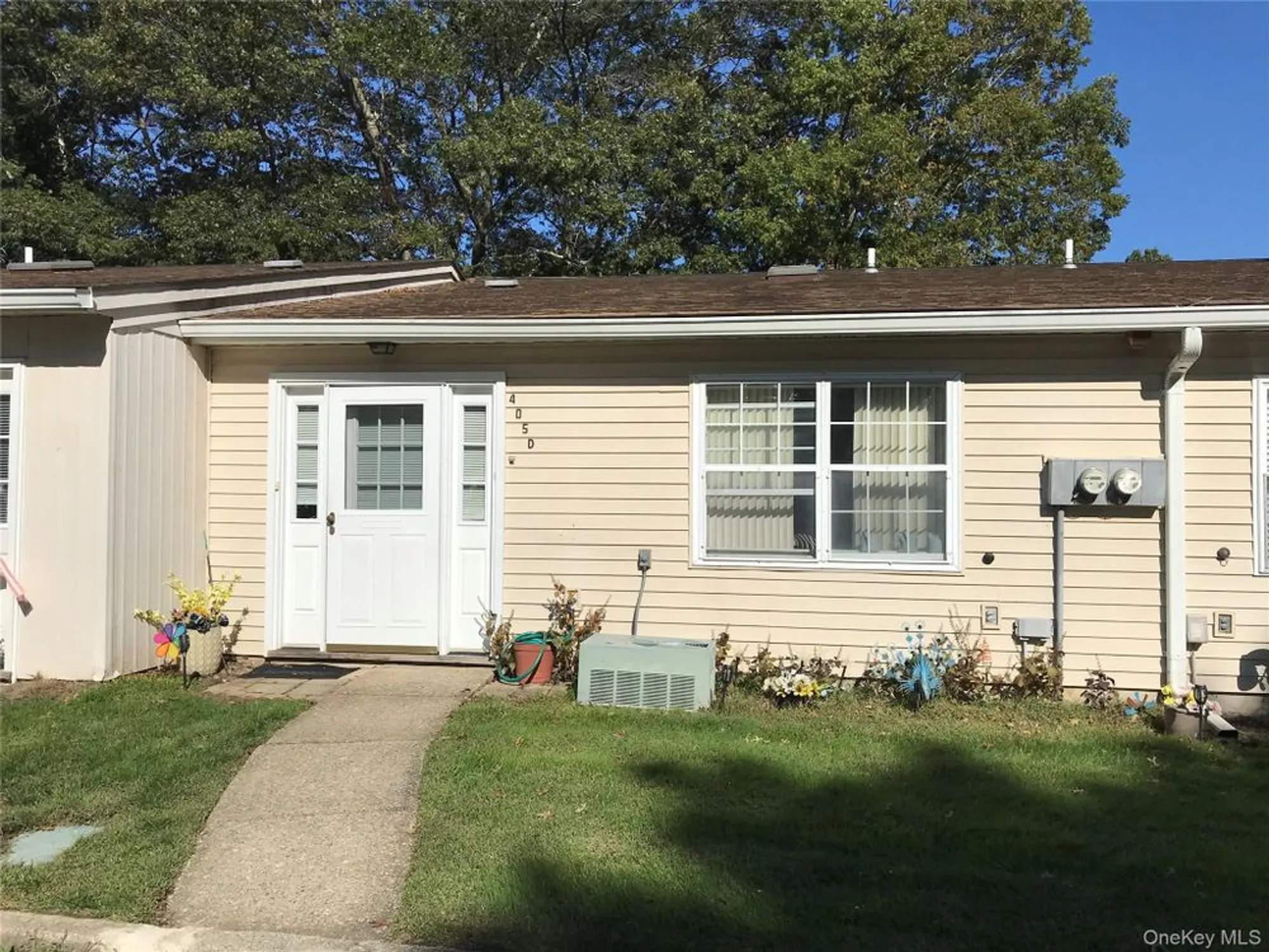 Property Slideshow image 1 of 13 | 405 woodbridge dr d, Ridge, NY, 11961