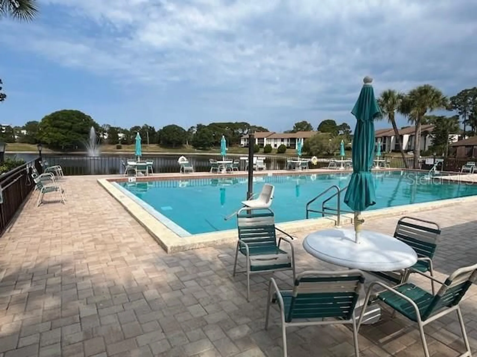 Property Slideshow image 24 of 28 | 1725 pine ridge way e apt e c, Palm Harbor, FL, 34684