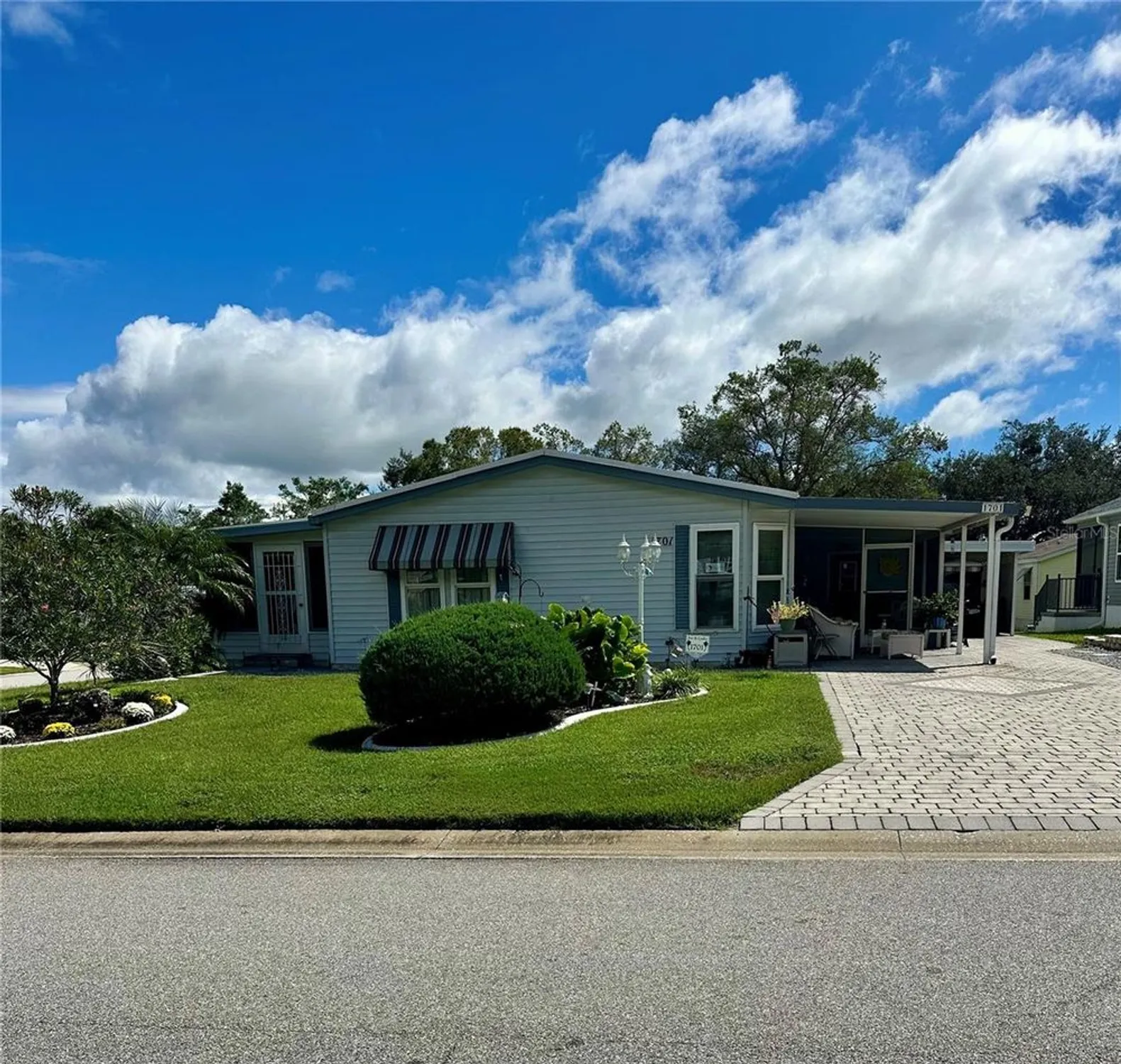 Property Slideshow image 2 of 37 | 1701 palm aire dr, The Villages, FL, 32159