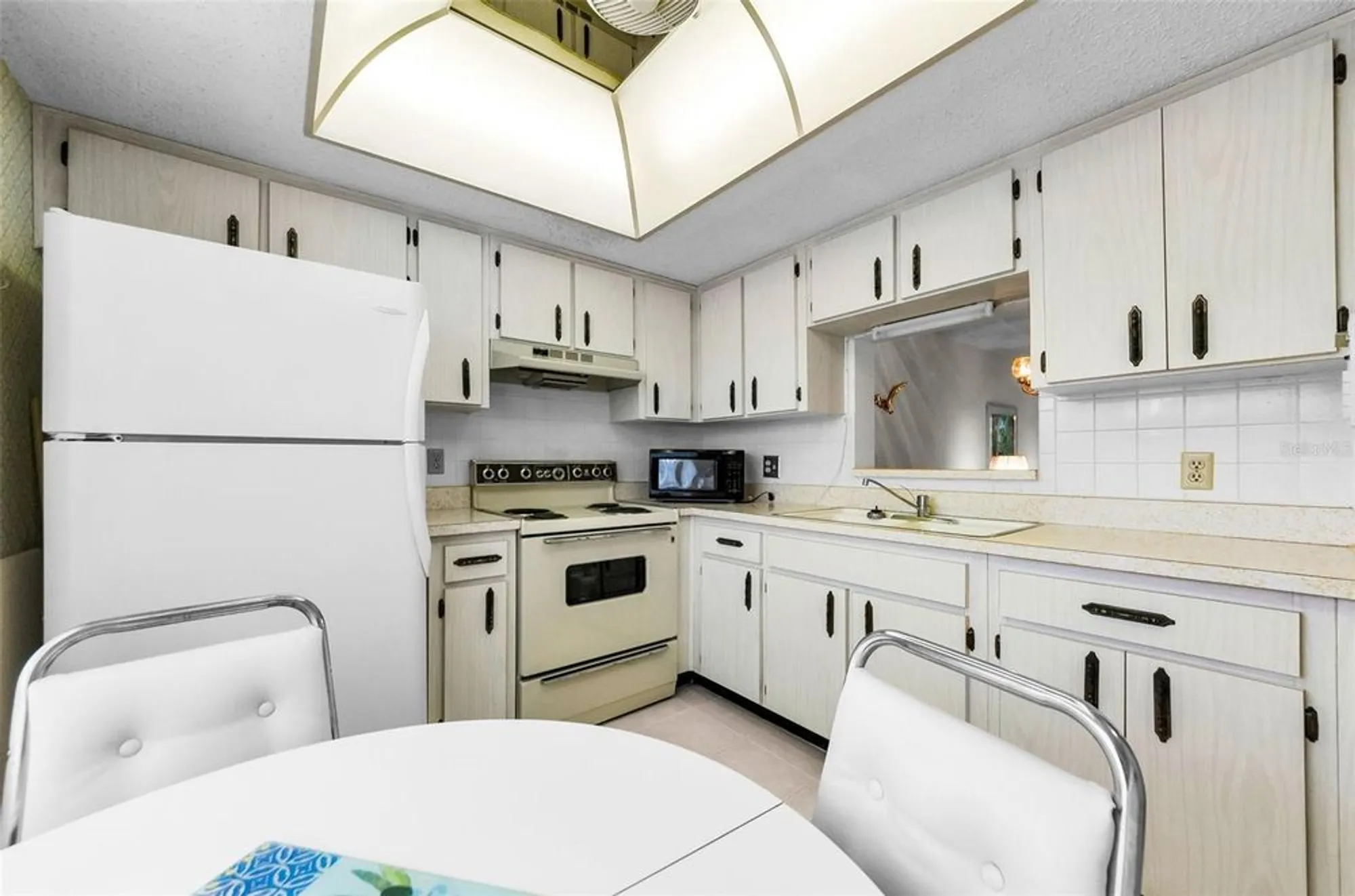 Property Slideshow image 7 of 41 | 1450 heather ridge blvd 307, Dunedin, FL, 34698