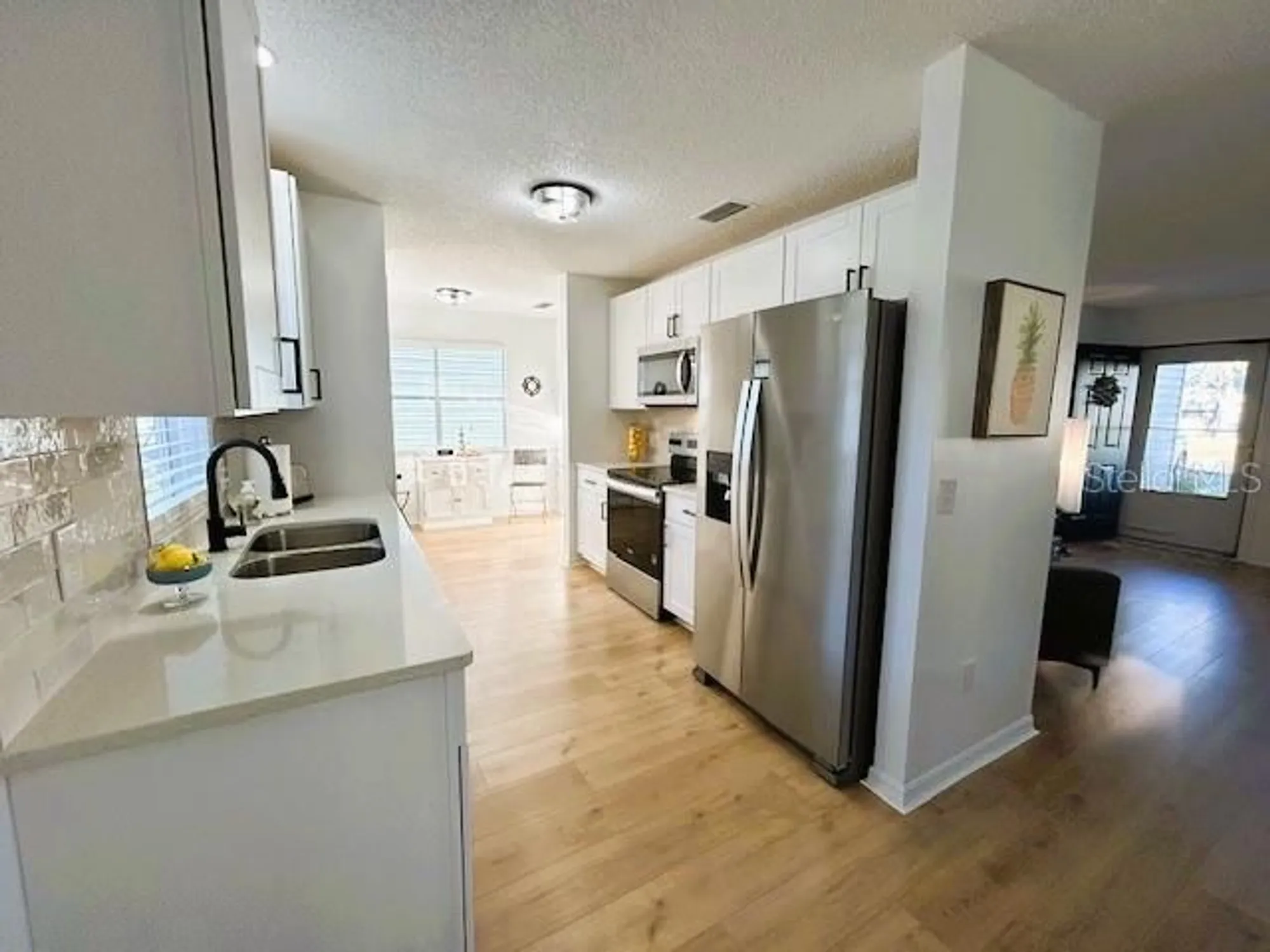 Property Slideshow image 7 of 41 | 528 valencia pl, Lady Lake, FL, 32159