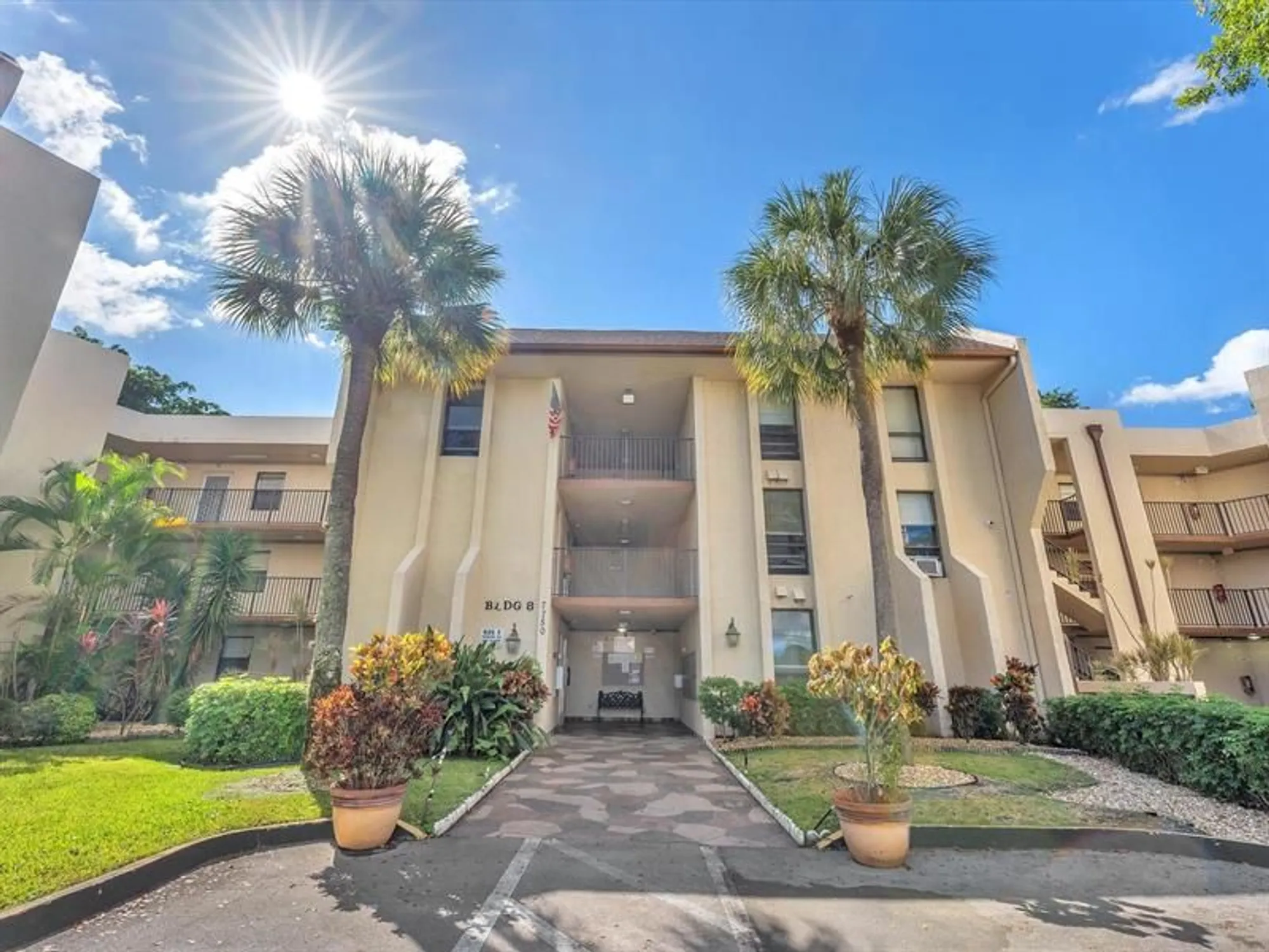 Property Slideshow image 1 of 37 | 7750 w mcnab rd apt 202, Tamarac, FL, 33321