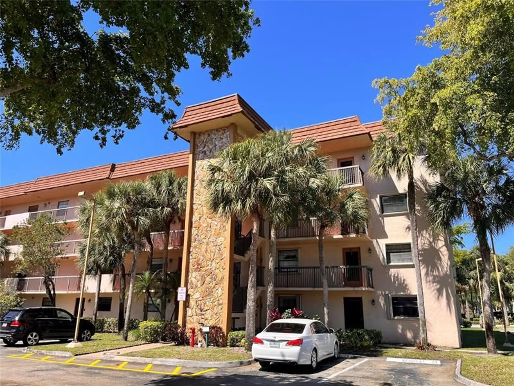 Property Slideshow image 1 of 25 | 4940 e sabal palm blvd apt 414, Tamarac, FL, 33319