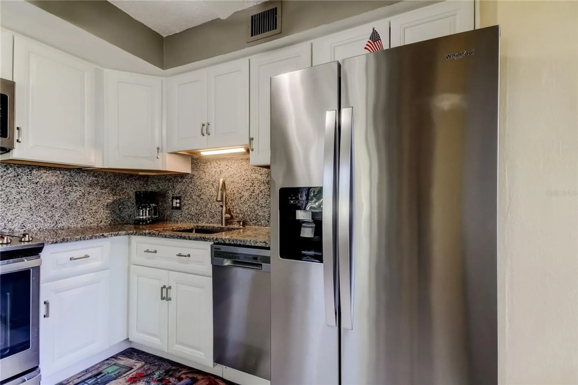 Property Slideshow image 19 of 75 | 2457 ecuadorian way apt 57, Clearwater, FL, 33763
