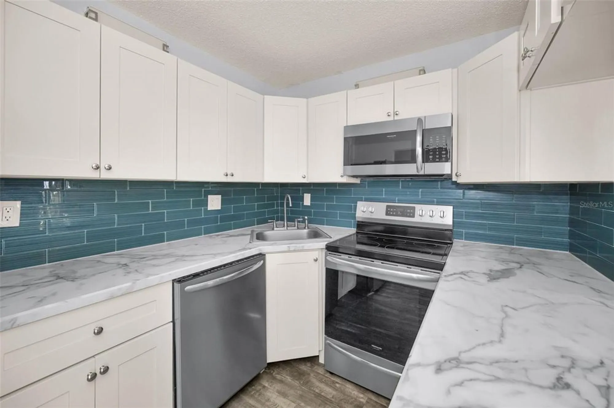 Property Slideshow image 12 of 70 | 2687 pine ridge way e1, Palm Harbor, FL, 34684