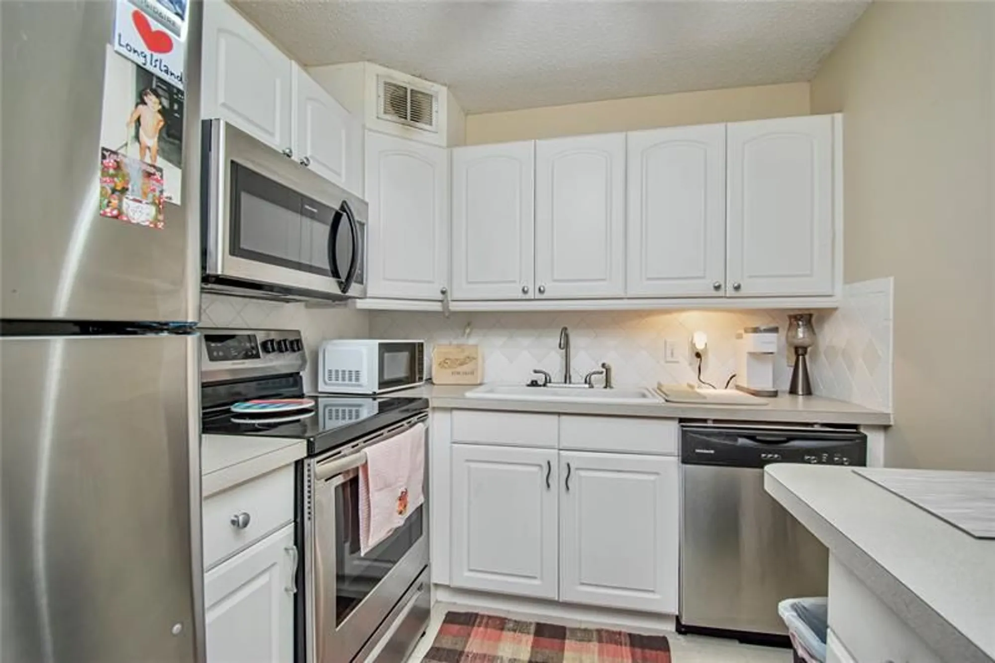 Property Slideshow image 9 of 30 | 235 kent n # 235, West Palm Beach, FL, 33417