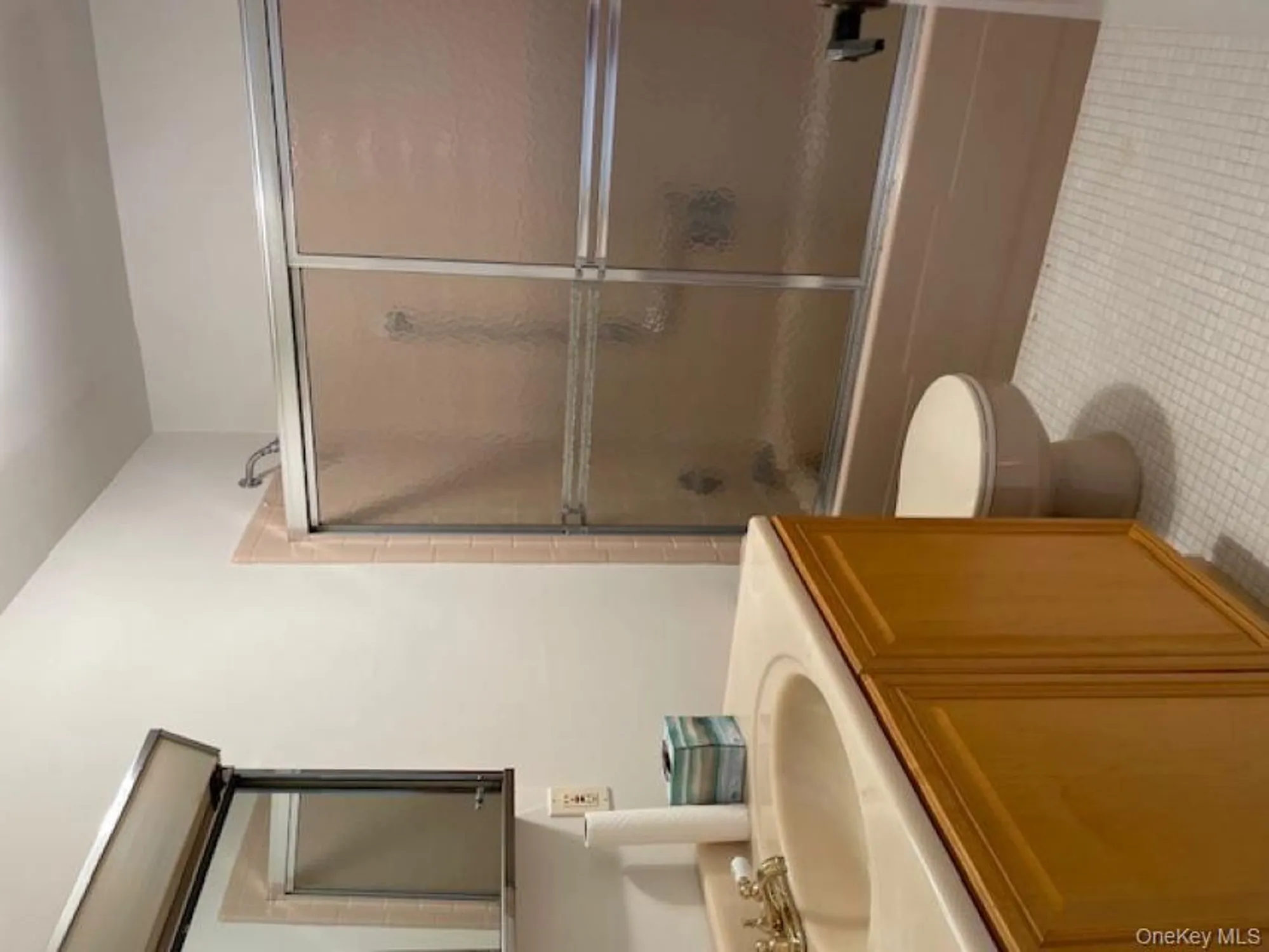 Property Slideshow image 12 of 14 | 120 exmore ct d, Ridge, NY, 11961