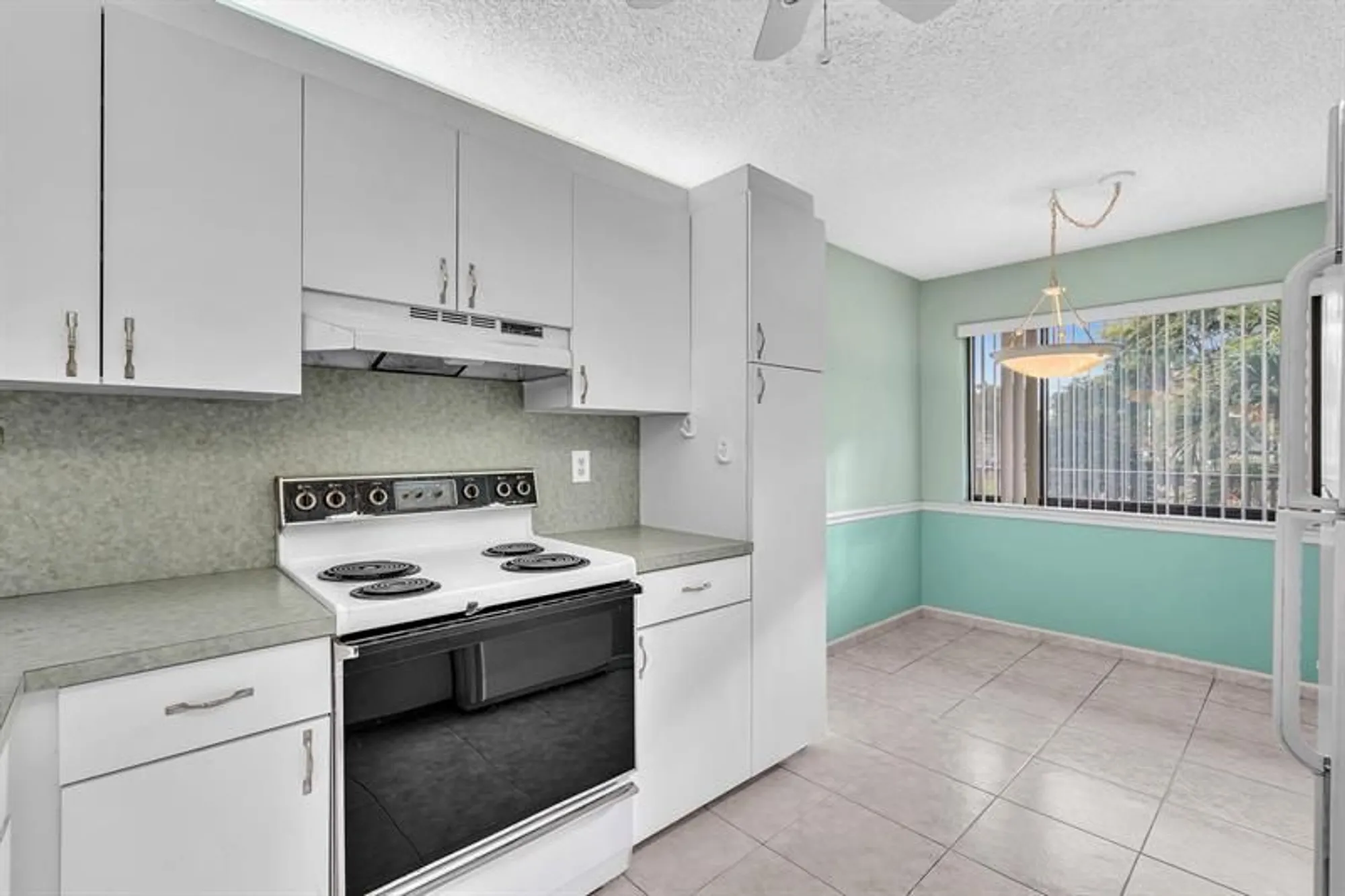 Property Slideshow image 7 of 82 | 10442 e clairmont cir 204, Tamarac, FL, 33321