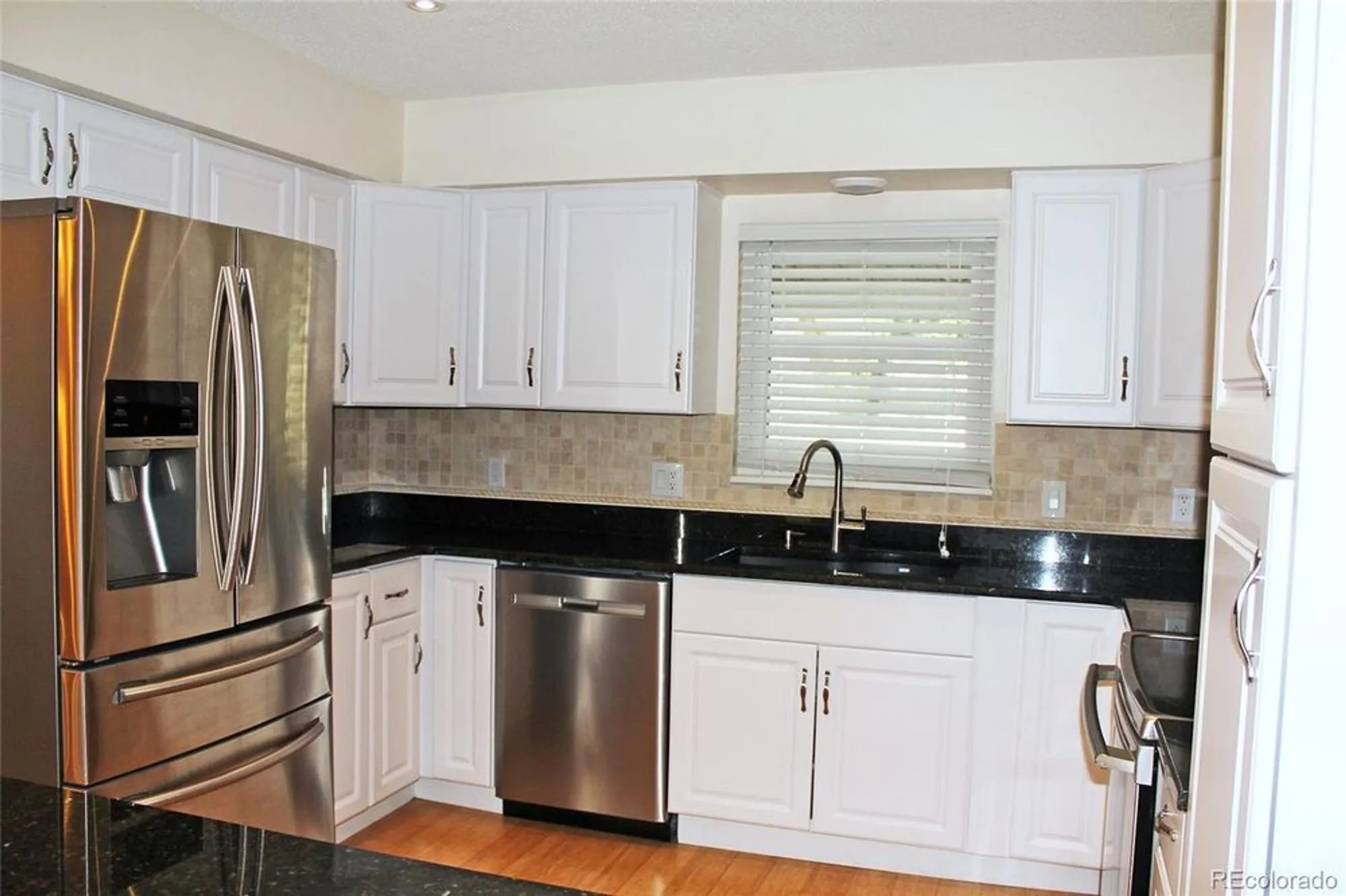 Property Slideshow image 9 of 35 | 2734 s heather gardens way, Aurora, CO, 80014