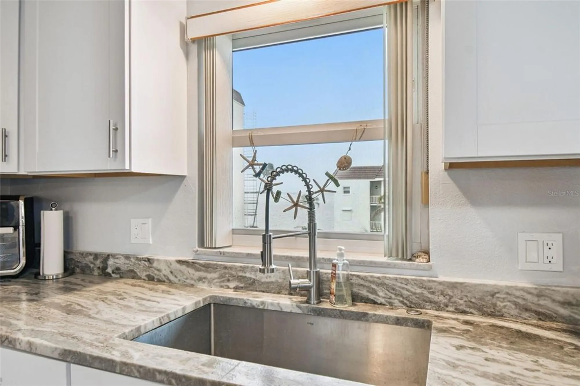 Property Slideshow image 9 of 59 | 8 glencoe pl 307, Dunedin, FL, 34698