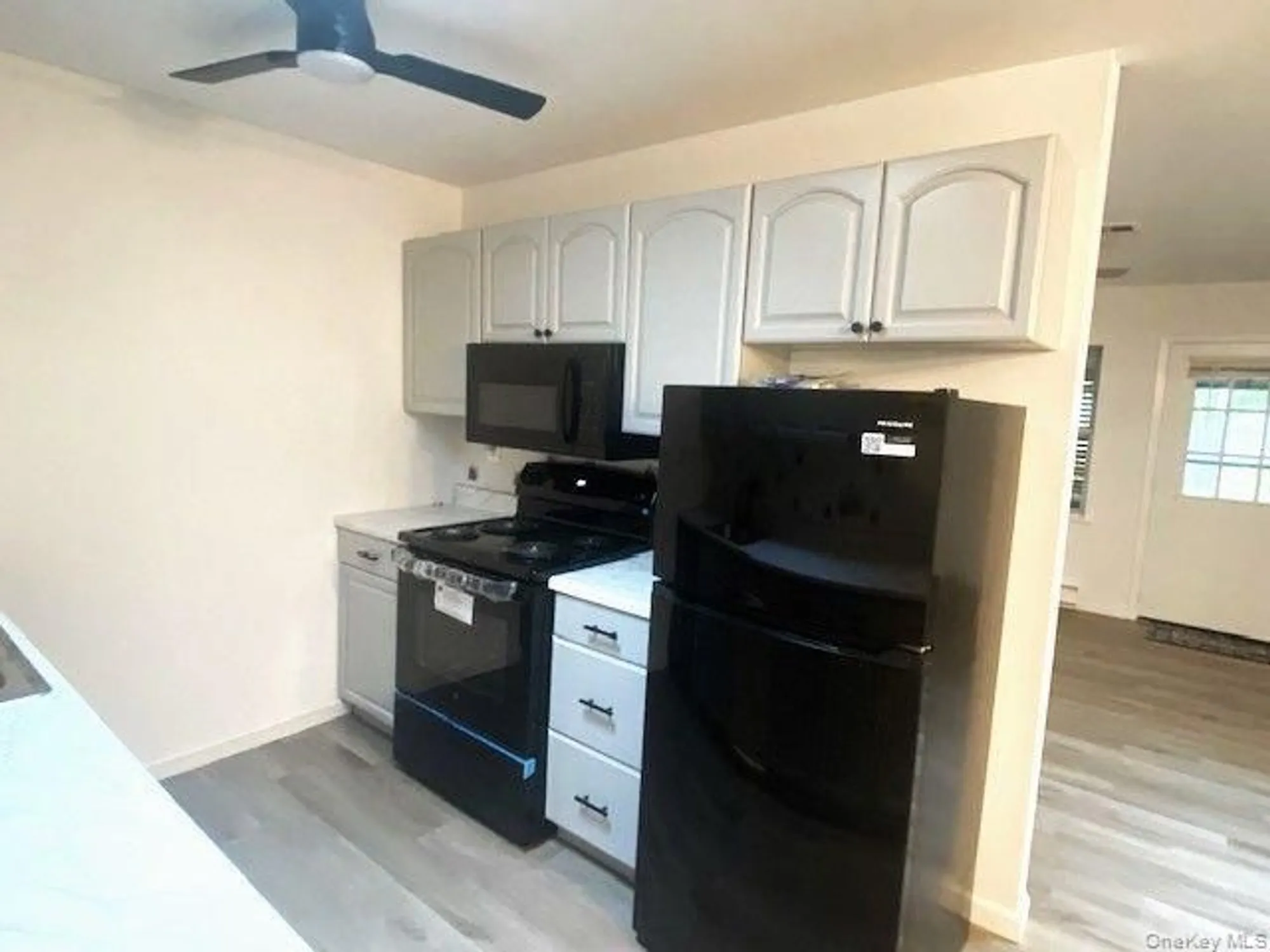 Property Slideshow image 10 of 21 | 259 newcastle ct e, Ridge, NY, 11961