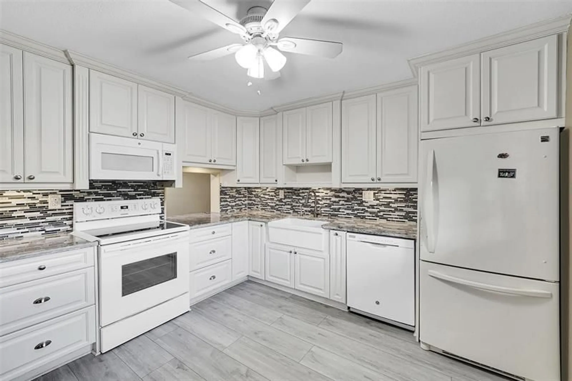 Property Slideshow image 1 of 30 | 4950 e sabal palm blvd 302, Tamarac, FL, 33319