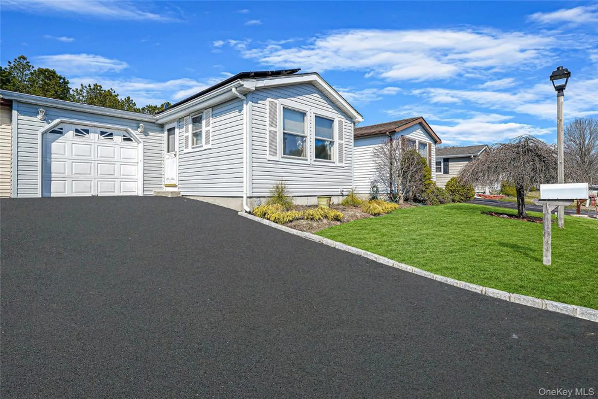 Property Slideshow image 2 of 29 | 91 village cir, Manorville, NY, 11949