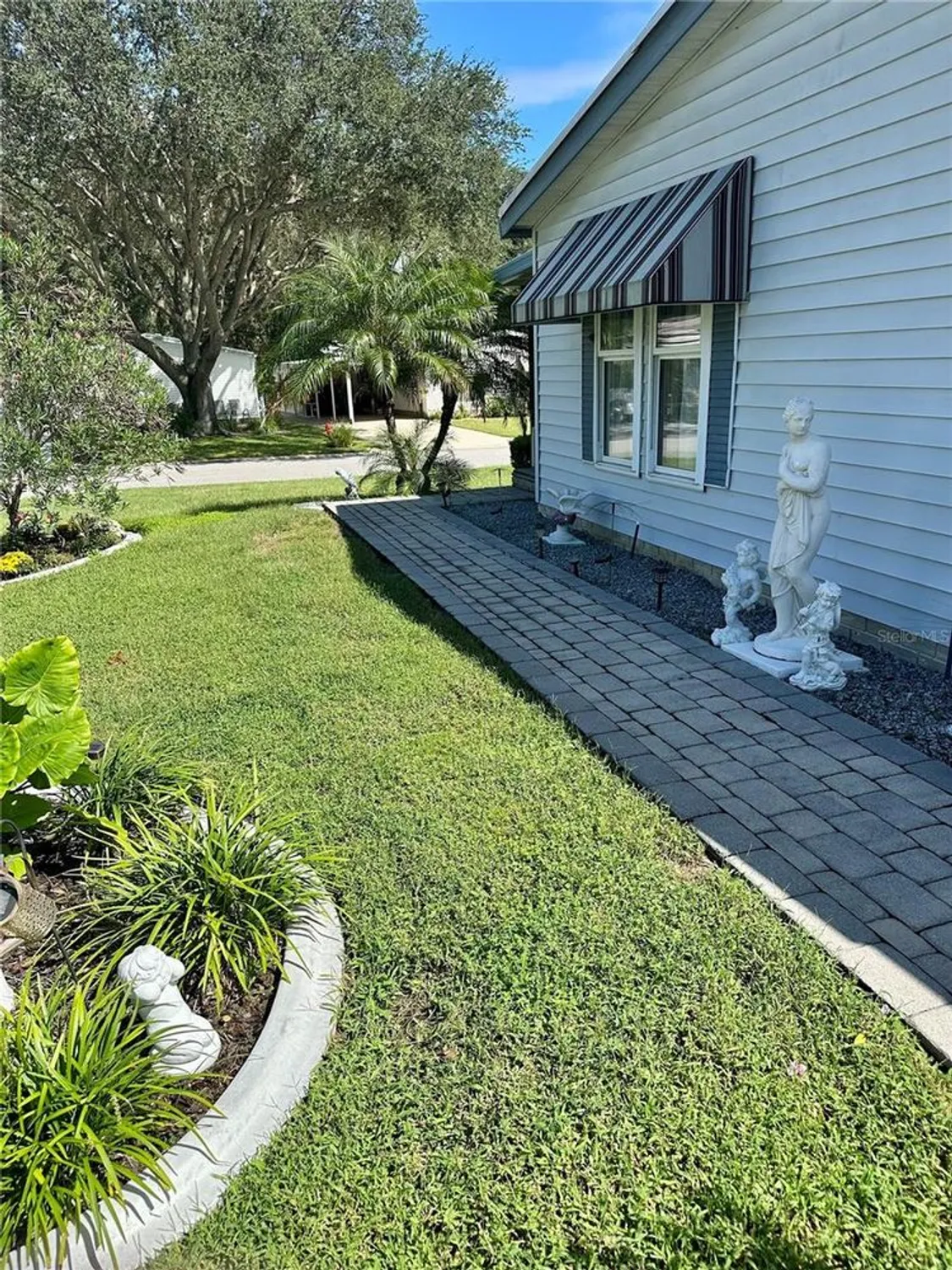 Property Slideshow image 35 of 37 | 1701 palm aire dr, The Villages, FL, 32159