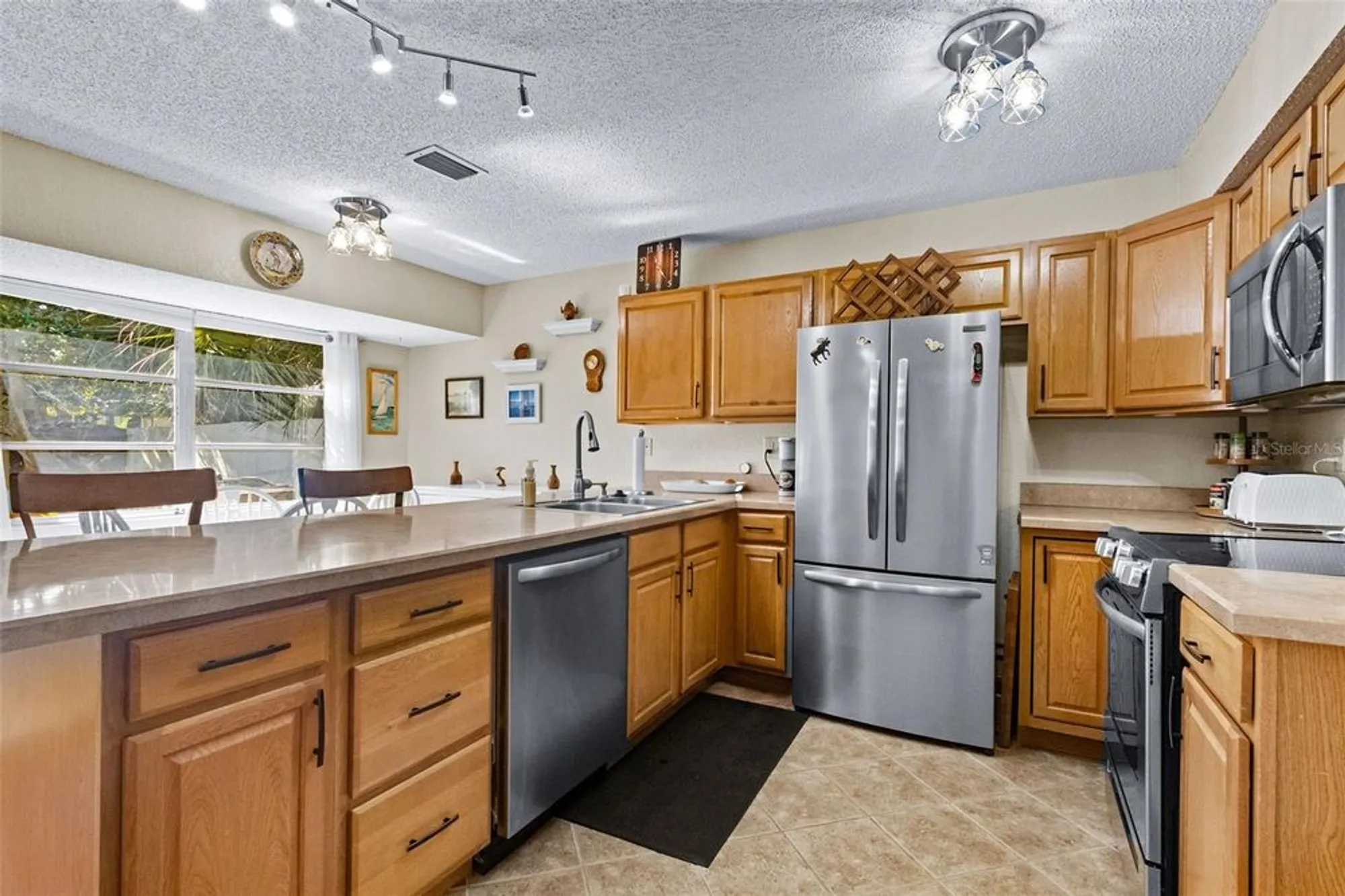 Property Slideshow image 10 of 37 | 1417 heather ridge blvd, Dunedin, FL, 34698