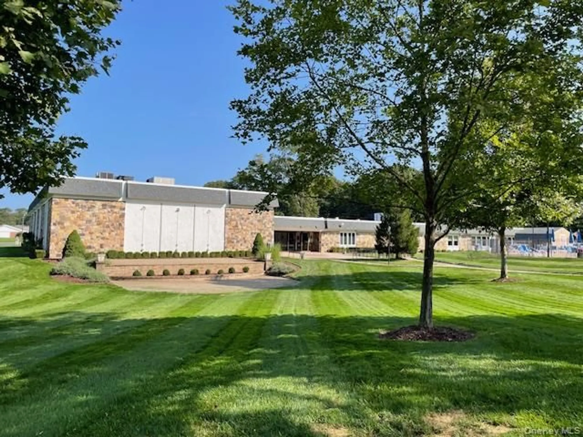 Property Slideshow image 7 of 14 | 120 exmore ct d, Ridge, NY, 11961