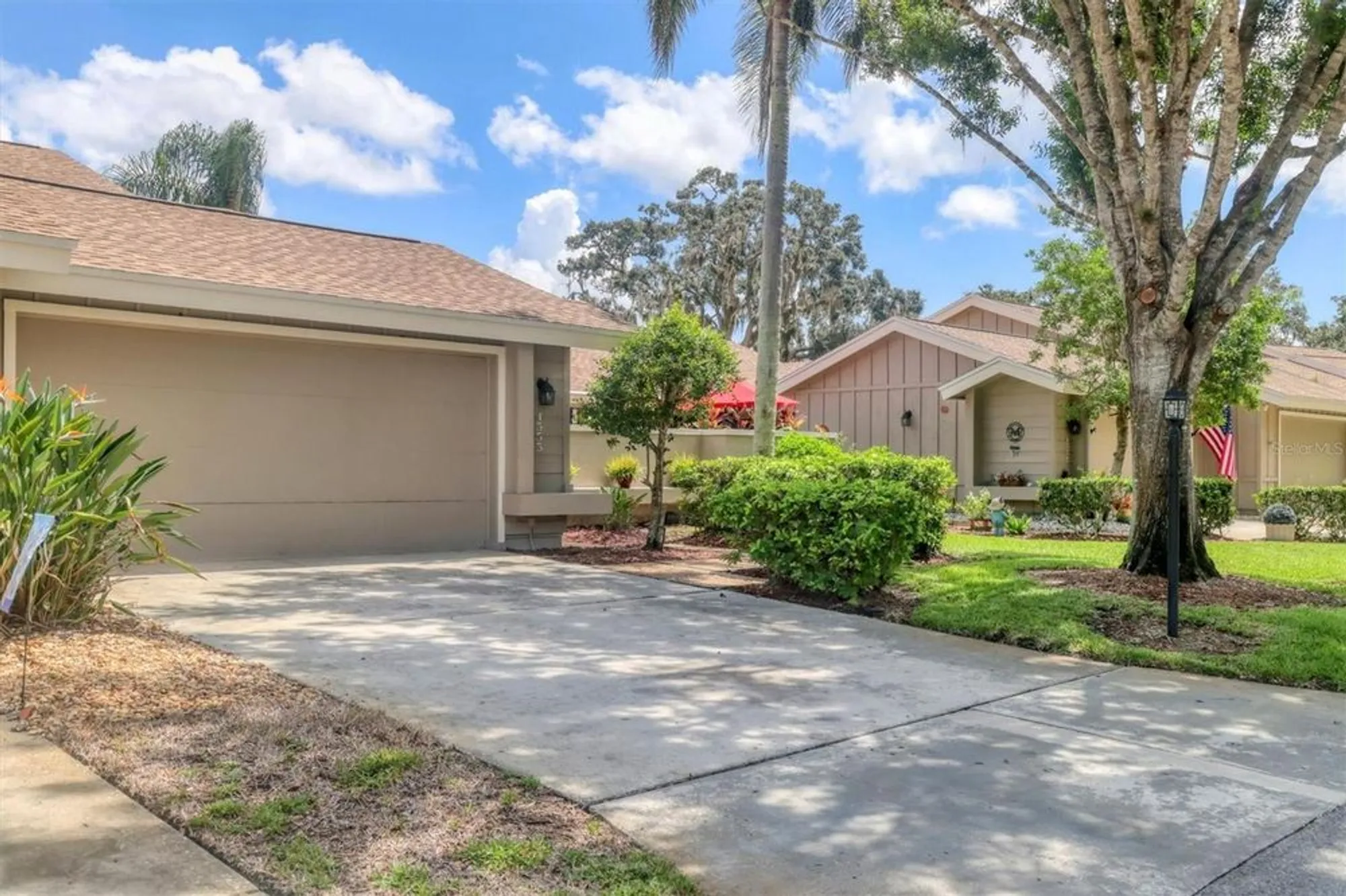 Property Slideshow image 3 of 78 | 4555 forest wood trl 23, Sarasota, FL, 34241