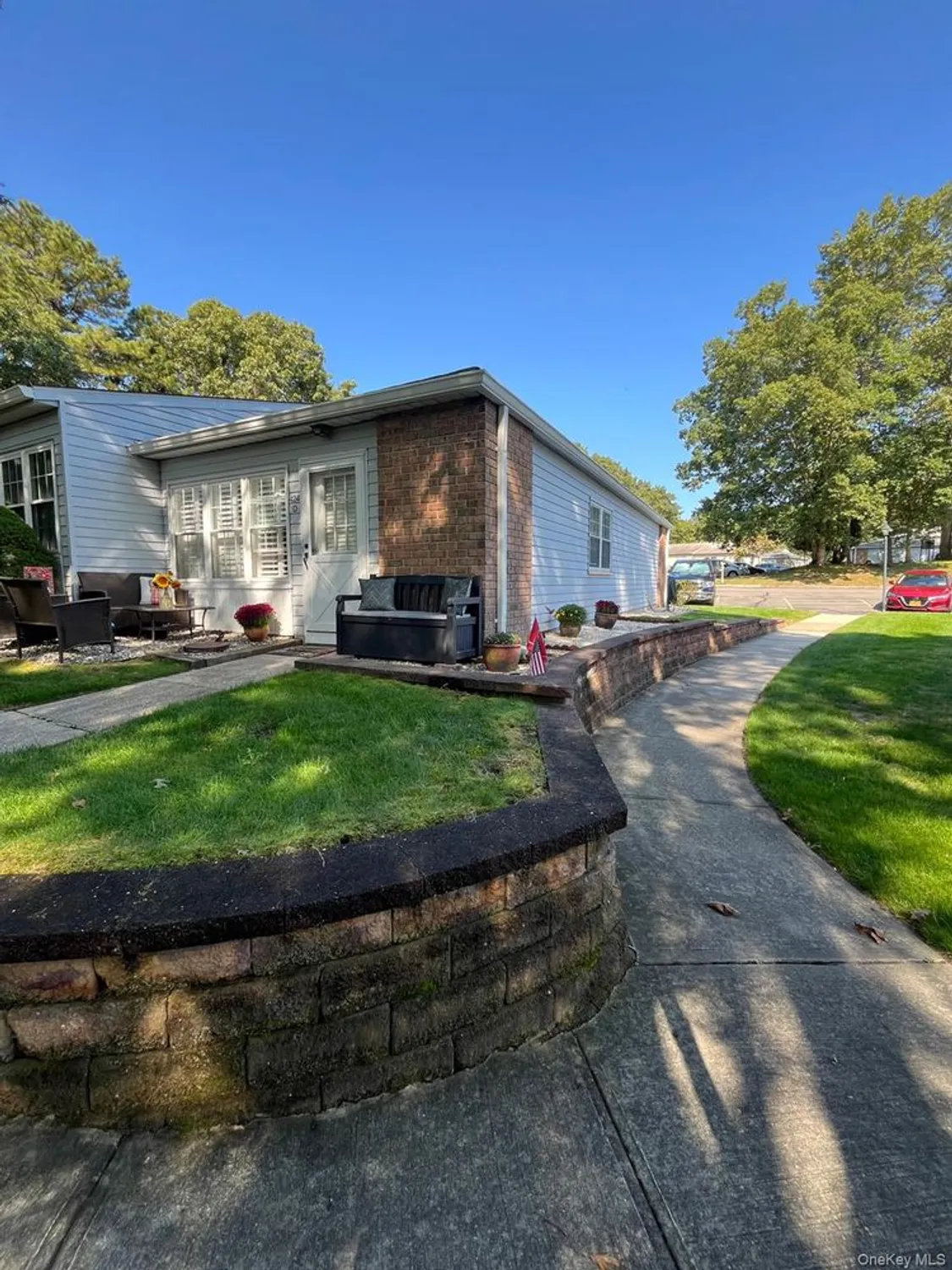 Property Slideshow image 2 of 21 | 424 woodbridge dr d, Ridge, NY, 11961