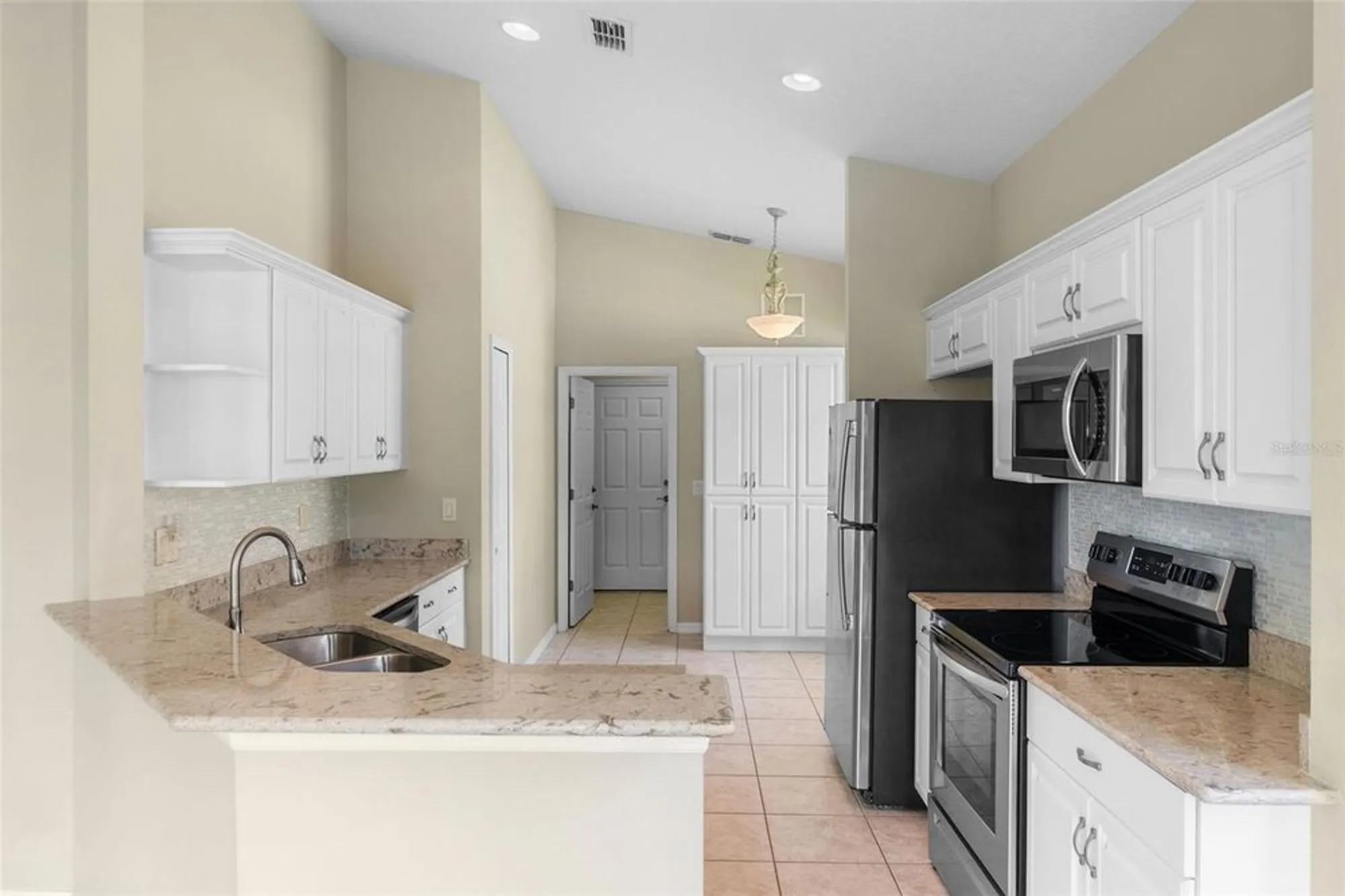 Property Slideshow image 10 of 63 | 890 summit greens blvd, Clermont, FL, 34711
