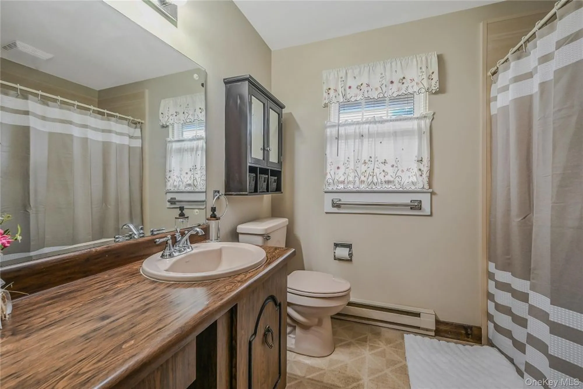 Property Slideshow image 14 of 24 | 310 woodbridge dr unit c, Ridge, NY, 11961