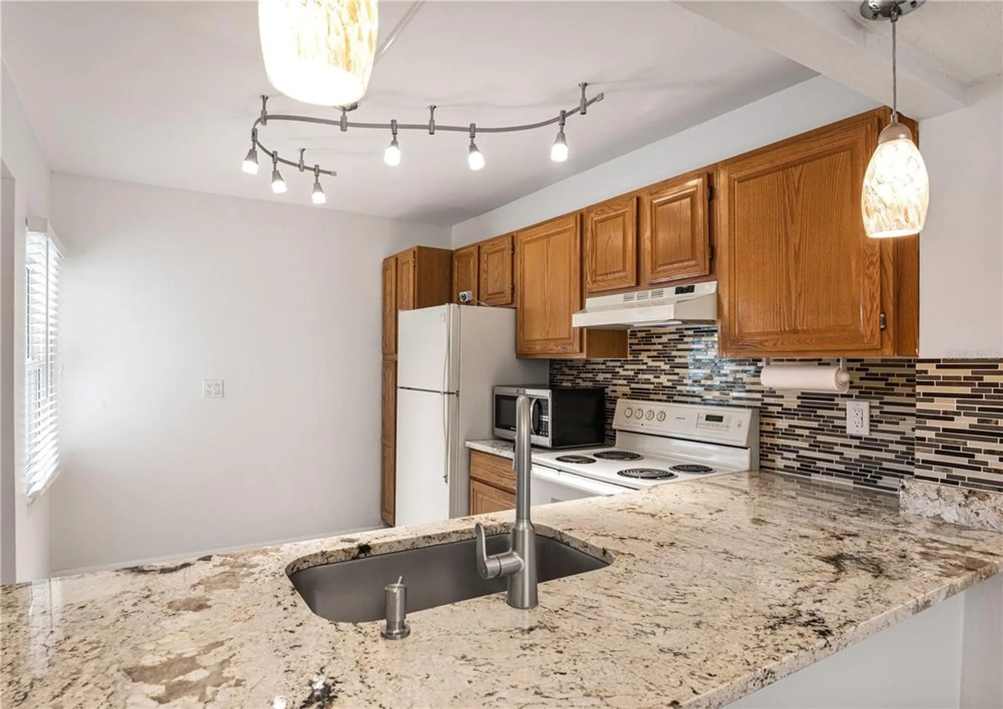 Property Slideshow image 4 of 23 | 14130 rosemary ln apt 4313, Largo, FL, 33774