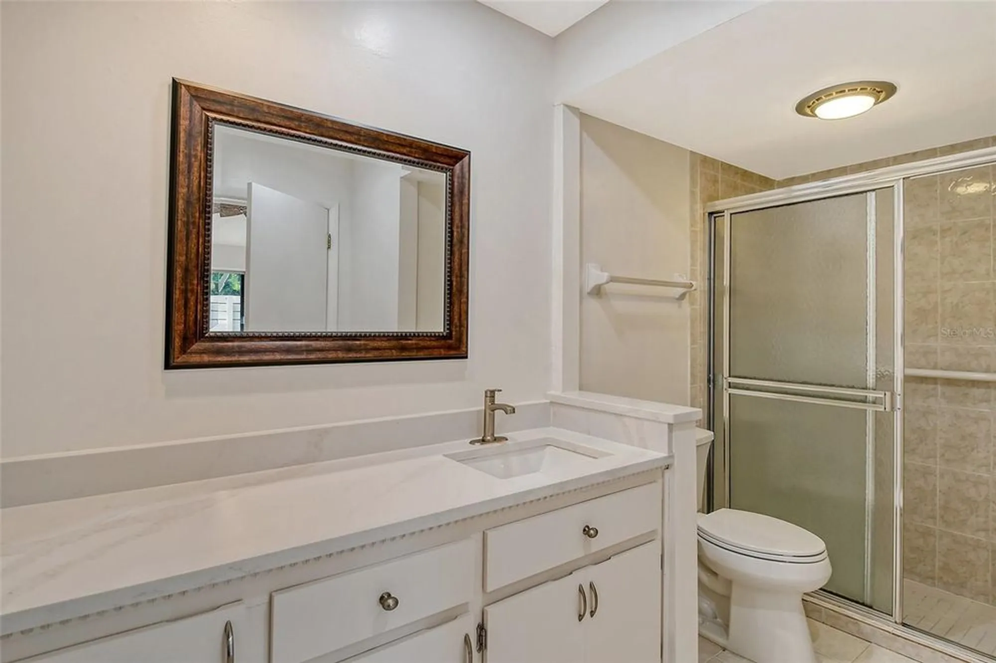 Property Slideshow image 30 of 37 | 6947 woodwind dr 77, Sarasota, FL, 34231
