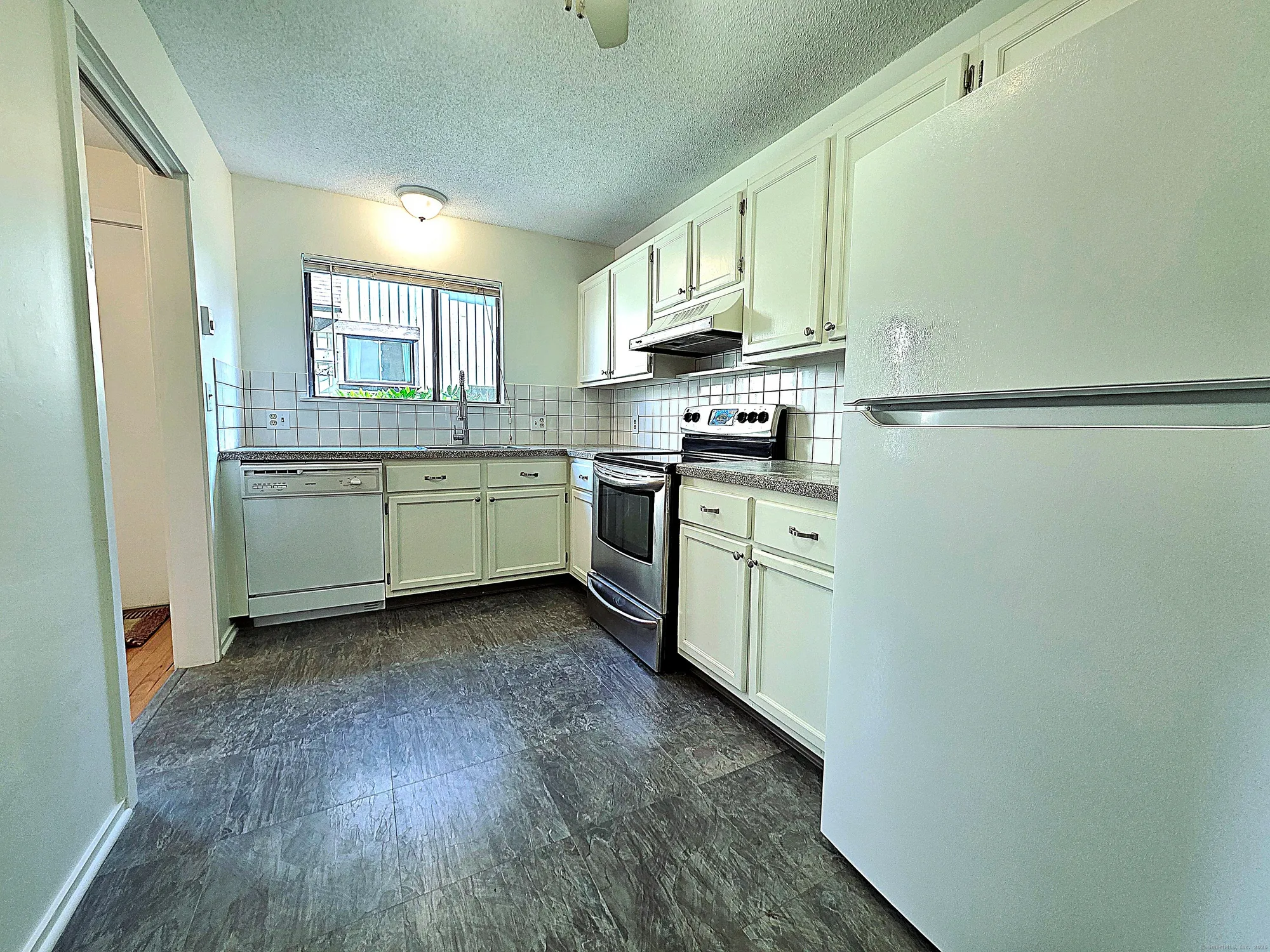 Property Slideshow image 6 of 39 | 563 heritage vlg f, Southbury, CT, 06488
