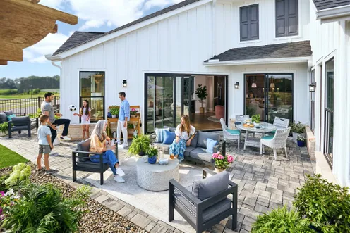 Back patio with seating and family