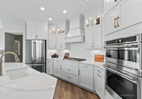 Bright kitchen with white cabinetry