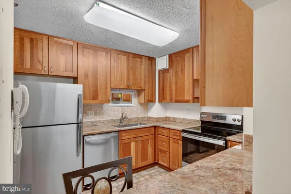 Property Slideshow image 3 of 29 | 15101 interlachen dr 1-123, Silver Spring, MD, 20906