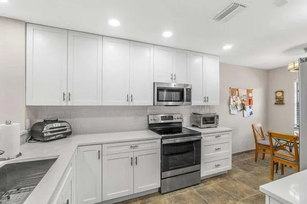 Property Slideshow image 3 of 43 | 25 stratford dr d, Boynton Beach, FL, 33436