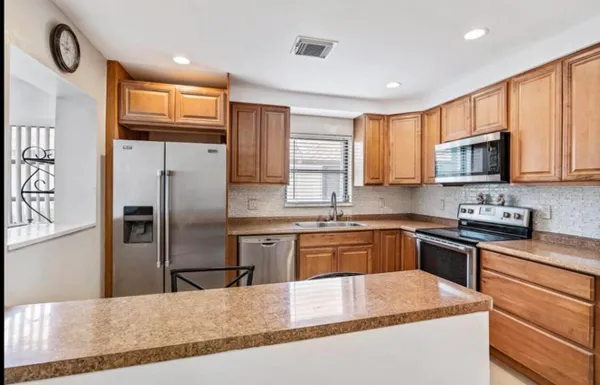 Property Slideshow image 2 of 15 | 6089 glentree ln, Greenacres, FL, 33463