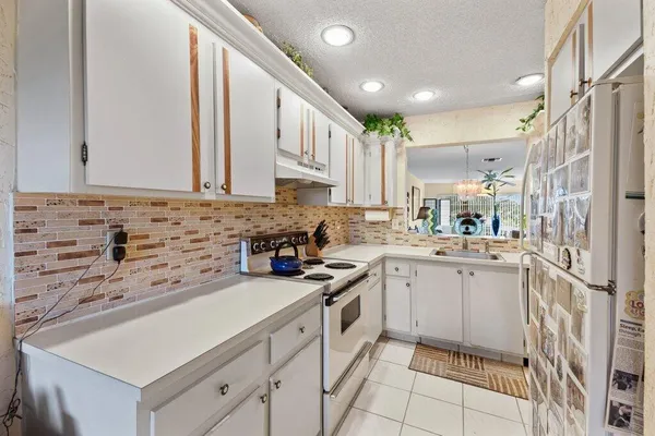 Property Slideshow image 3 of 47 | 13465 fishtail palm ct e, Delray Beach, FL, 33484