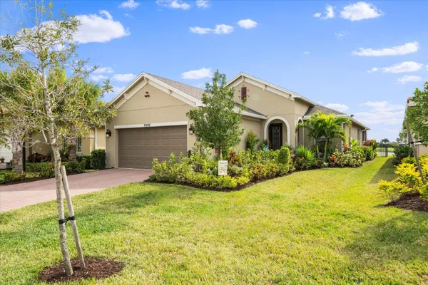 Property Slideshow image 2 of 34 | 9597 sw royal poinciana dr, Port Saint Lucie, FL, 34987