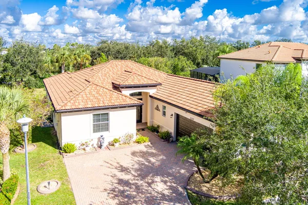 Property Slideshow image 2 of 73 | 11357 sw hillcrest cir, Port Saint Lucie, FL, 34987