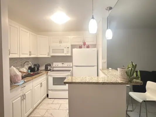 Property Slideshow image 2 of 15 | 76 cambridge d d, West Palm Beach, FL, 33417