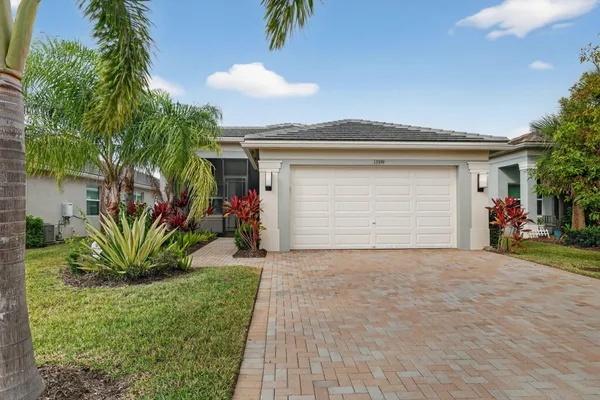 Property Slideshow image 2 of 89 | 13399 sw river rock rd, Port Saint Lucie, FL, 34987