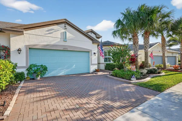 Property Slideshow image 2 of 58 | 12895 sw lake fern cir, Port Saint Lucie, FL, 34987
