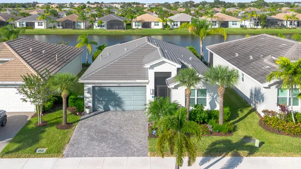 Property Slideshow image 2 of 62 | 11397 sw carlisle crossing ave, Port Saint Lucie, FL, 34987