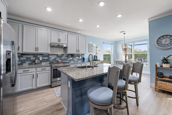 Property Slideshow image 2 of 59 | 11392 sw carlisle crossing ave, Port Saint Lucie, FL, 34987