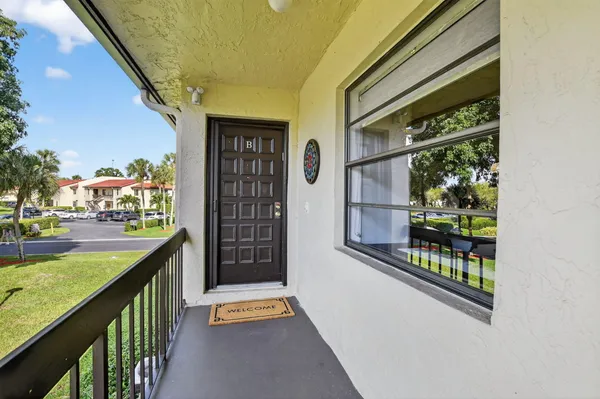 Property Slideshow image 2 of 55 | 8310 casa del lago apt 1b, Boca Raton, FL, 33433