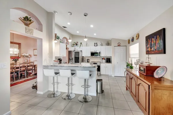 Property Slideshow image 3 of 65 | 5670 swaying palm ln, Boynton Beach, FL, 33437