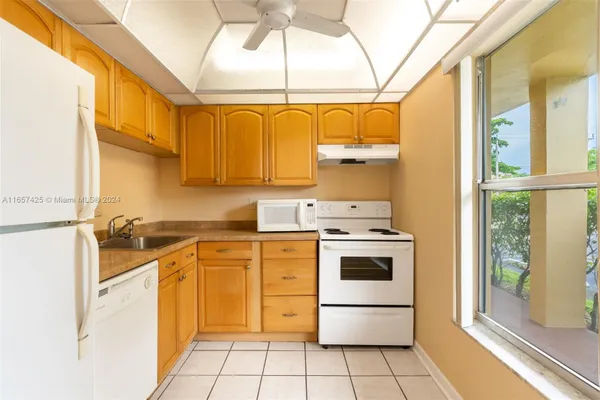 Property Slideshow image 3 of 19 | 5830 nw 64th ave apt 105, Tamarac, FL, 33319