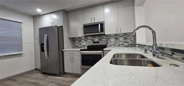 Property Slideshow image 2 of 22 | 100 sw 130th ter 309c, Pembroke Pines, FL, 33027