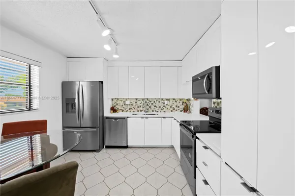 Property Slideshow image 2 of 18 | 4970 e sabal palm blvd apt 309, Tamarac, FL, 33319