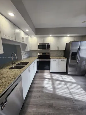 Property Slideshow image 3 of 24 | 1401 sw 128th ter apt 305h, Pembroke Pines, FL, 33027